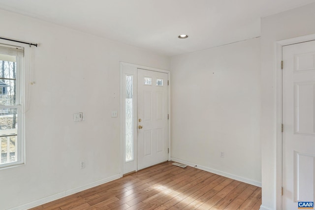 entrance foyer with recessed lighting, visible vents, baseboards, and light wood-style flooring