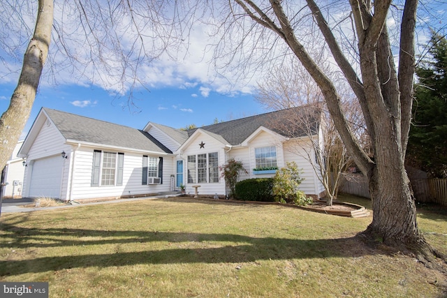 single story home with a garage, a shingled roof, a front yard, and fence