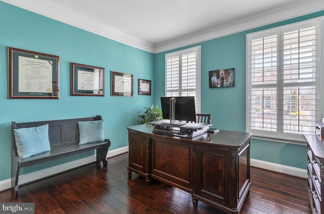 office space with a healthy amount of sunlight, crown molding, baseboards, and dark wood-style flooring