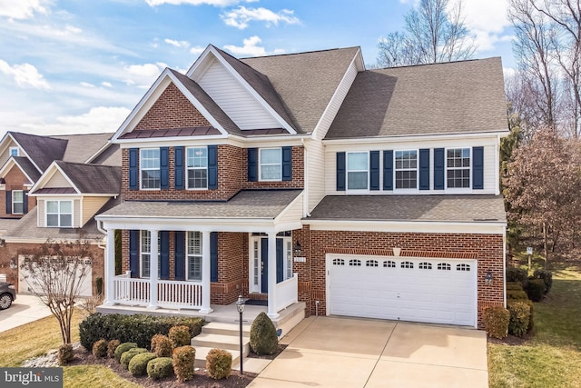 view of front of home featuring a garage, covered porch, brick siding, and concrete driveway