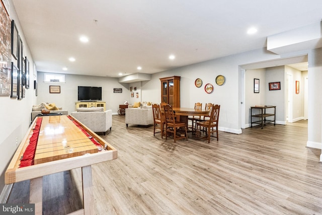 rec room with baseboards, wood finished floors, and recessed lighting