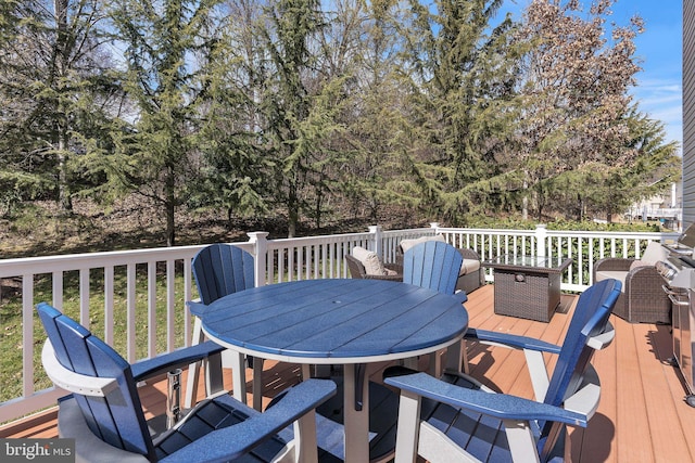 deck featuring outdoor dining space