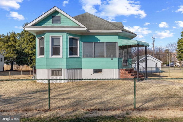 view of home's exterior with fence private yard