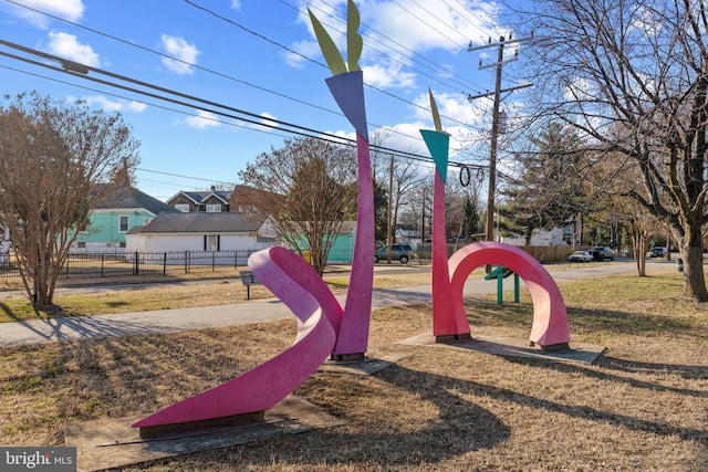 view of jungle gym with fence