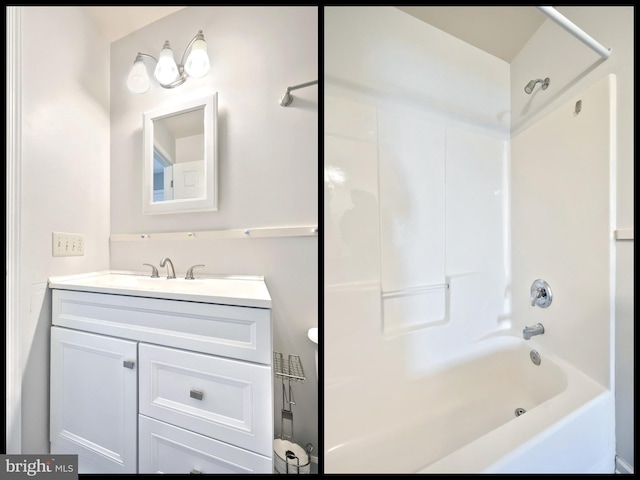 bathroom with vanity and bathing tub / shower combination