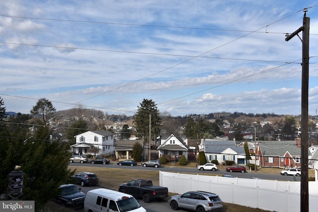 view of road with a residential view