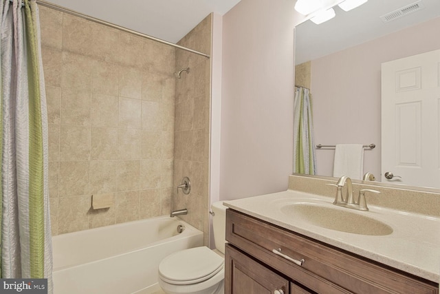 bathroom featuring visible vents, shower / bathtub combination with curtain, vanity, and toilet