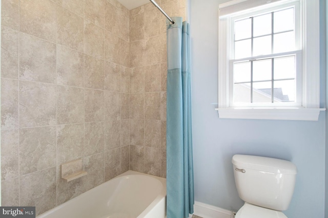 full bath featuring shower / bathtub combination with curtain and toilet