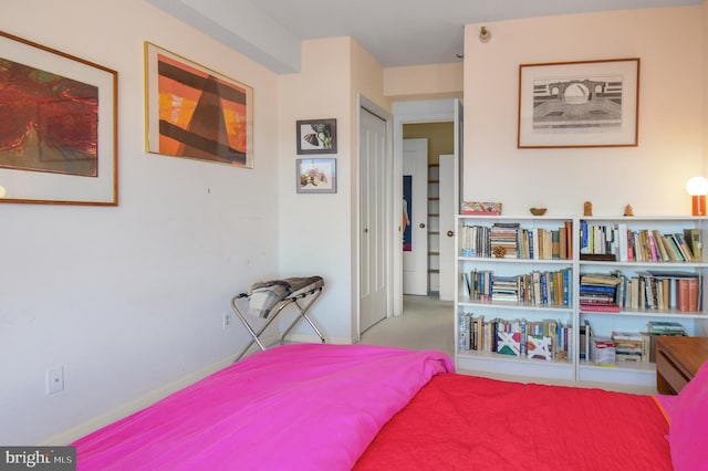 bedroom featuring baseboards