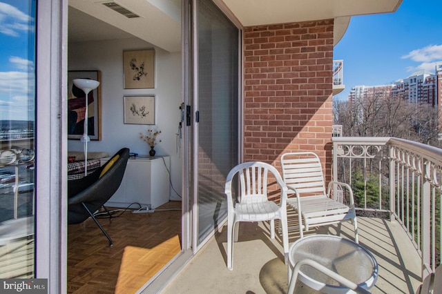 balcony featuring visible vents