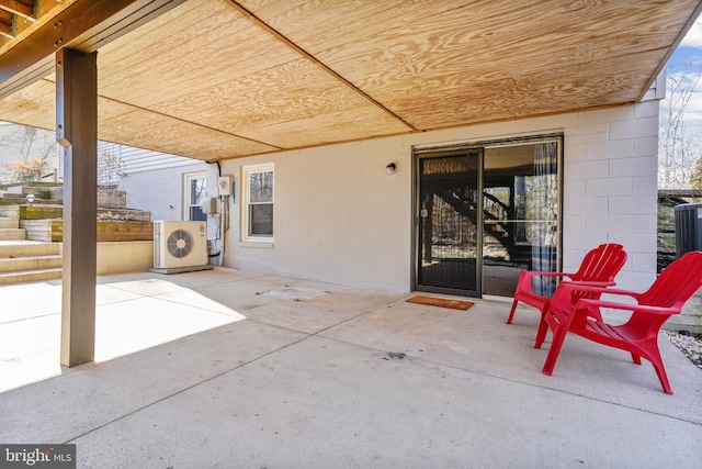 view of patio featuring ac unit