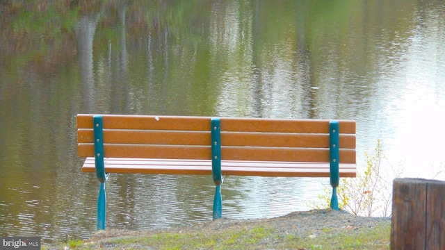 view of community with a water view