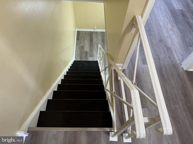 staircase with baseboards