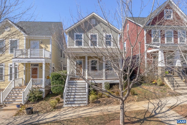 view of front facade with a porch and stairs