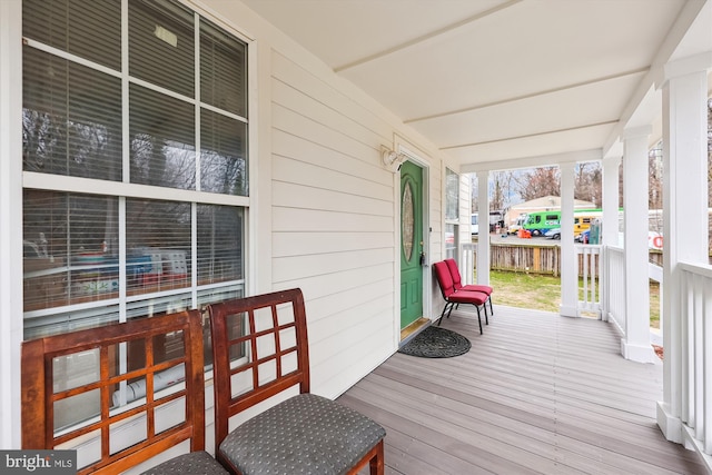 wooden deck featuring a porch