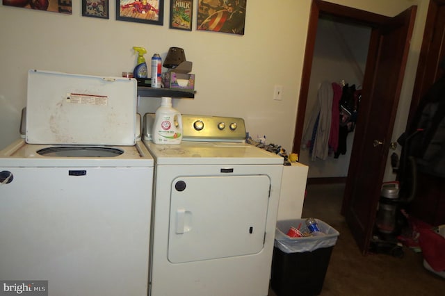 washroom with laundry area and independent washer and dryer