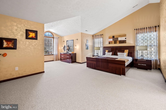 carpeted bedroom with lofted ceiling and multiple windows