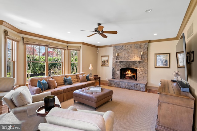 1900 Carrollton Rd, Annapolis, MD 21409 - living room featuring crown molding, ceiling fan, wood finished floors, and a fireplace