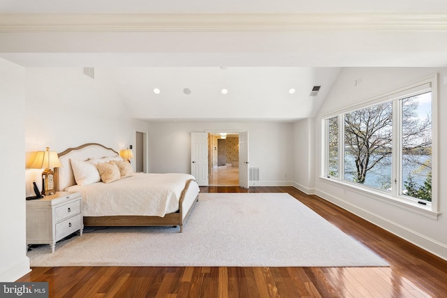1900 Carrollton Rd, Annapolis, MD 21409 - bedroom with baseboards, visible vents, wood finished floors, and lofted ceiling