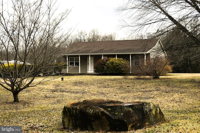 single story home featuring covered porch