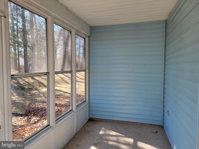 unfurnished sunroom with a wealth of natural light