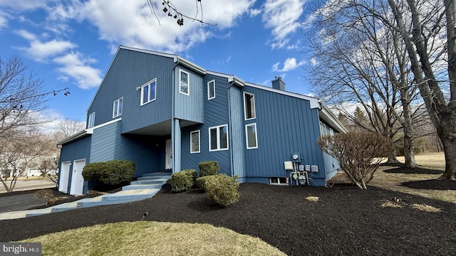 8 Margaret, West Windsor, NJ 08550 - view of front of property featuring an attached garage and a chimney