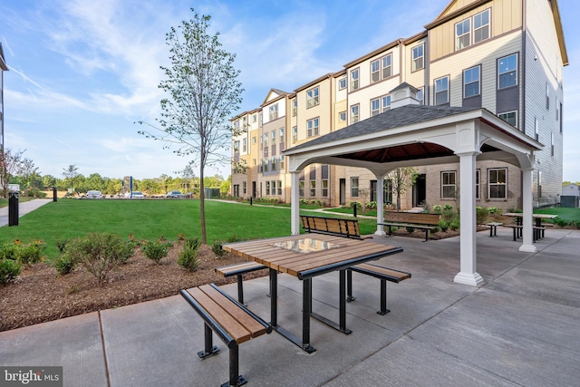 surrounding community featuring a yard and a gazebo