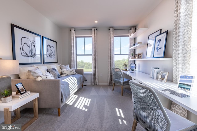 interior space featuring carpet floors, recessed lighting, built in study area, and baseboards