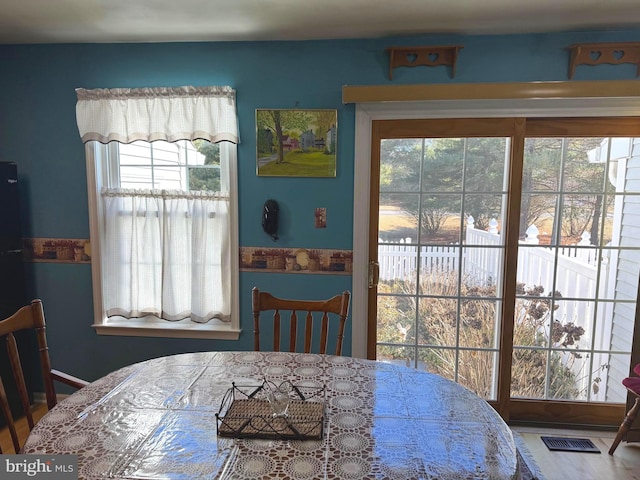 dining space featuring visible vents