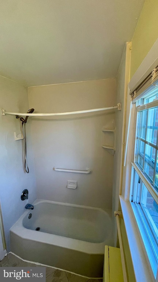 bathroom with shower / bathtub combination