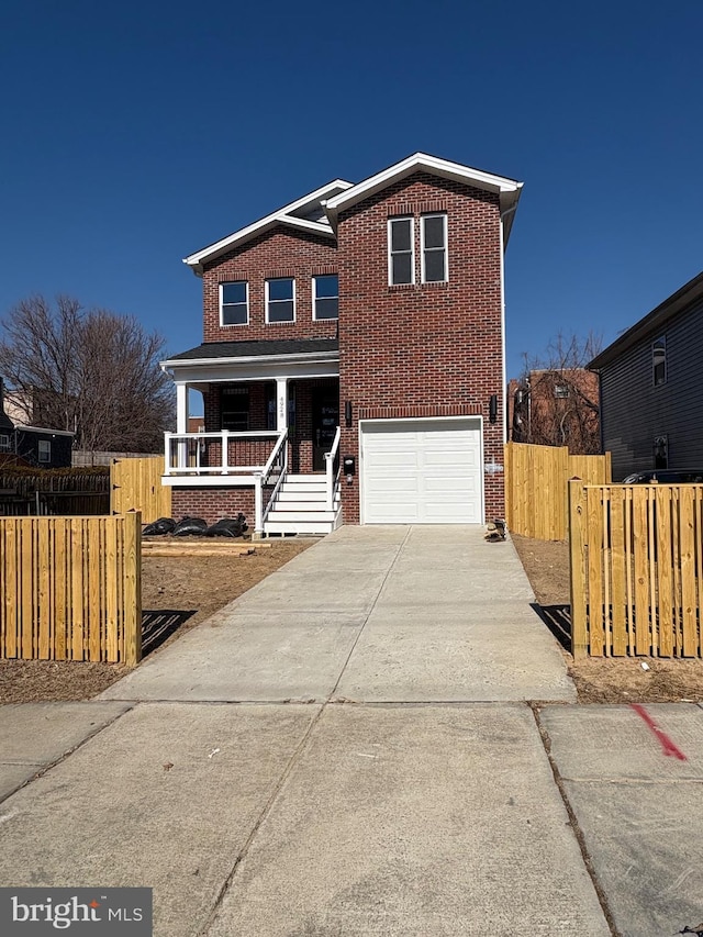 traditional home featuring covered porch, brick siding, fence, and concrete driveway