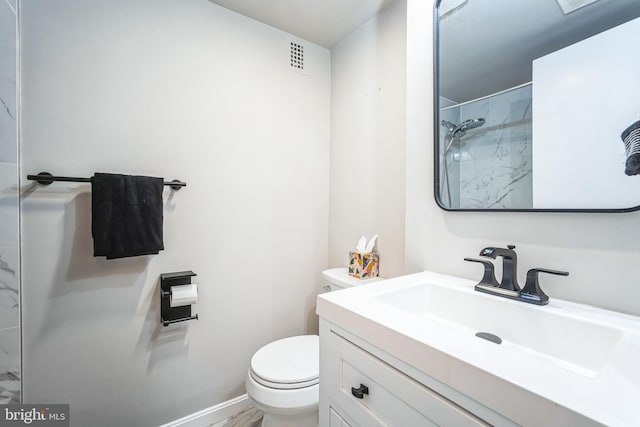 full bathroom featuring visible vents, vanity, toilet, and a shower