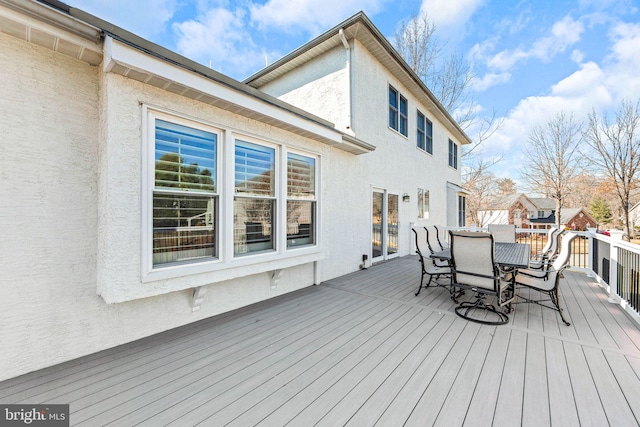 deck featuring outdoor dining space