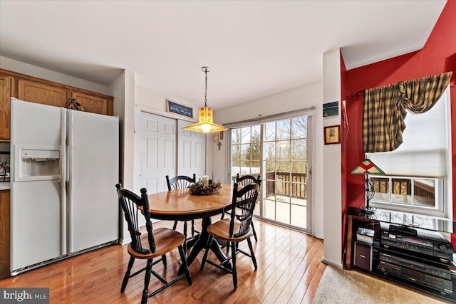 dining room featuring light wood finished floors