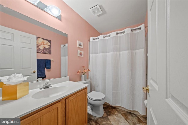 full bath with visible vents, toilet, stone finish flooring, vanity, and a shower with curtain