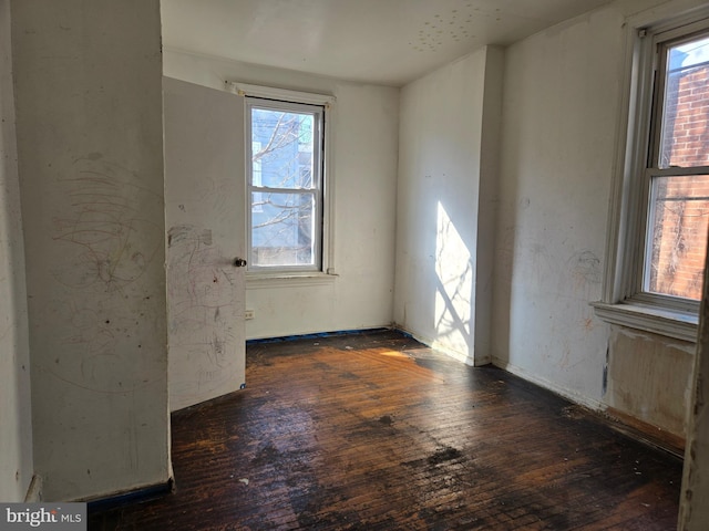 empty room featuring hardwood / wood-style floors