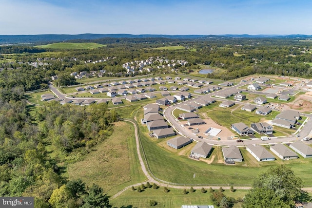 bird's eye view featuring a residential view and a view of trees