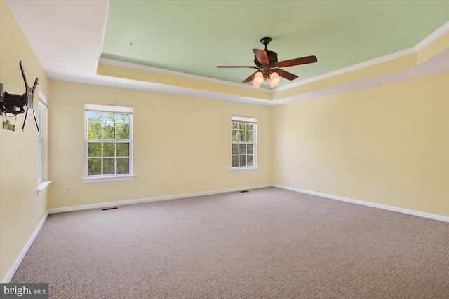 13010 Davenport Dr, Brandywine, MD 20613 - spare room featuring ornamental molding, a tray ceiling, visible vents, and carpet