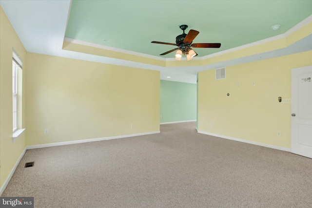 13010 Davenport Dr, Brandywine, MD 20613 - unfurnished room with visible vents, a tray ceiling, carpet, and crown molding