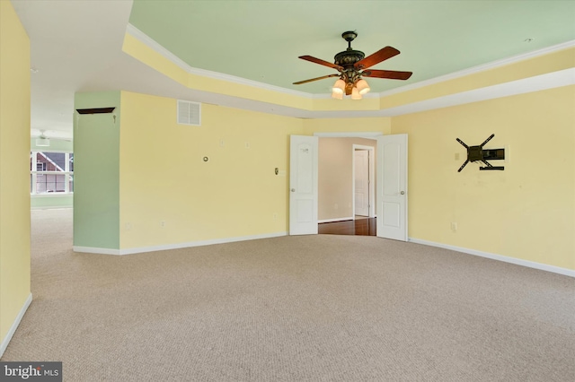 13010 Davenport Dr, Brandywine, MD 20613 - empty room featuring crown molding, visible vents, carpet floors, and a tray ceiling