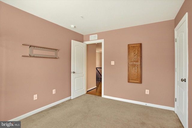 13010 Davenport Dr, Brandywine, MD 20613 - unfurnished bedroom with baseboards, carpet flooring, and visible vents