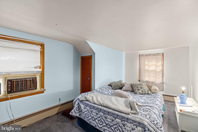 carpeted bedroom with lofted ceiling and baseboard heating