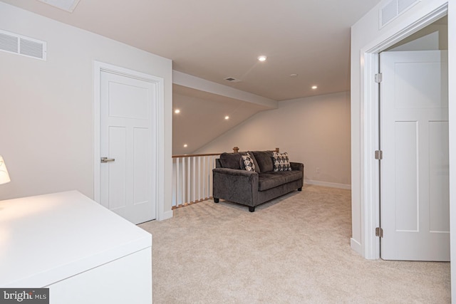 sitting room featuring recessed lighting, visible vents, and light colored carpet