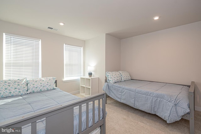 bedroom with visible vents, carpet flooring, and recessed lighting