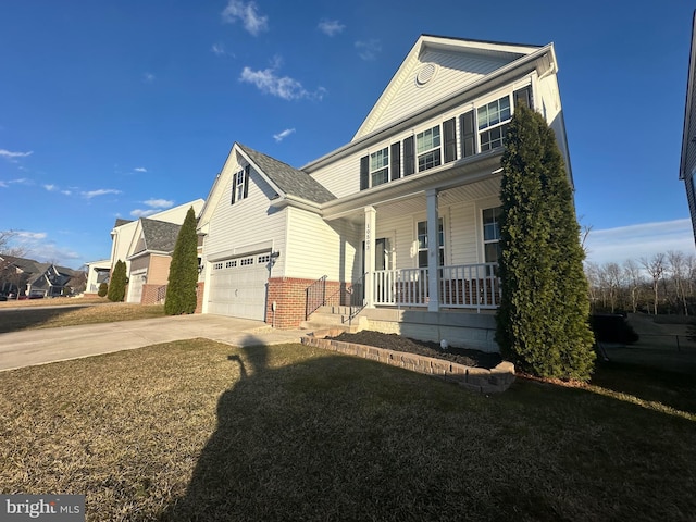 view of front of home featuring a porch, a garage, brick siding, driveway, and a front lawn