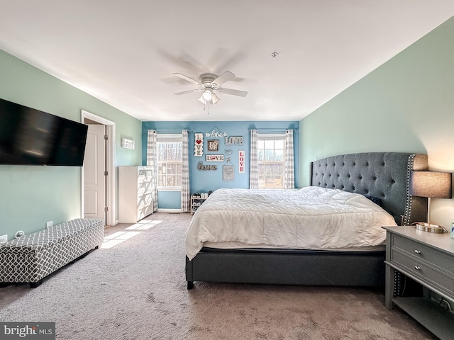 carpeted bedroom featuring a ceiling fan