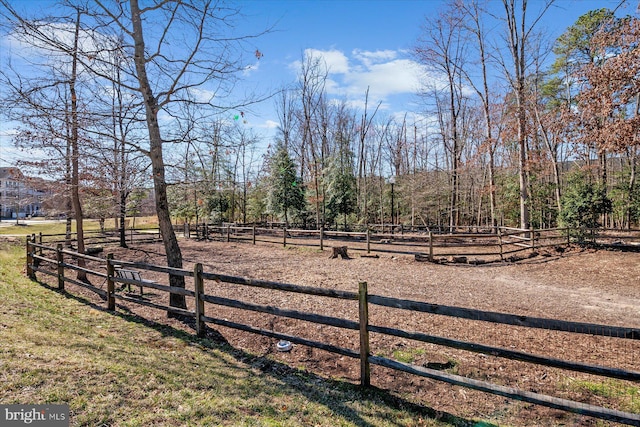 view of yard with an enclosed area and fence