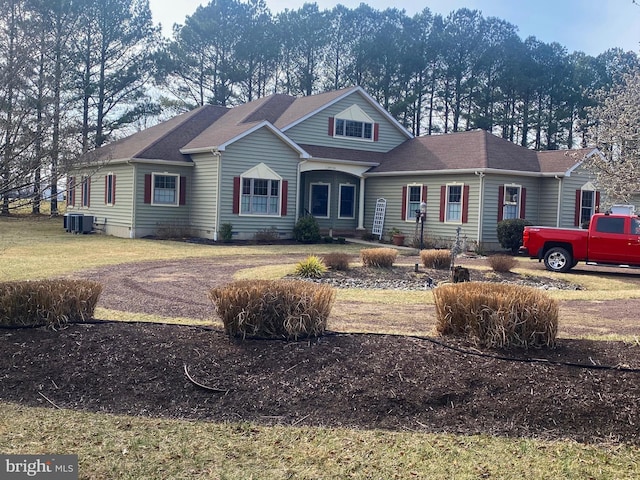 view of front of property with crawl space, a front lawn, and central AC unit