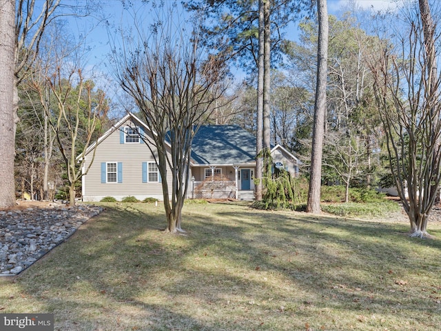 view of front facade with covered porch and a front yard