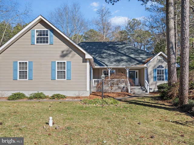 view of front of house featuring covered porch and a front lawn